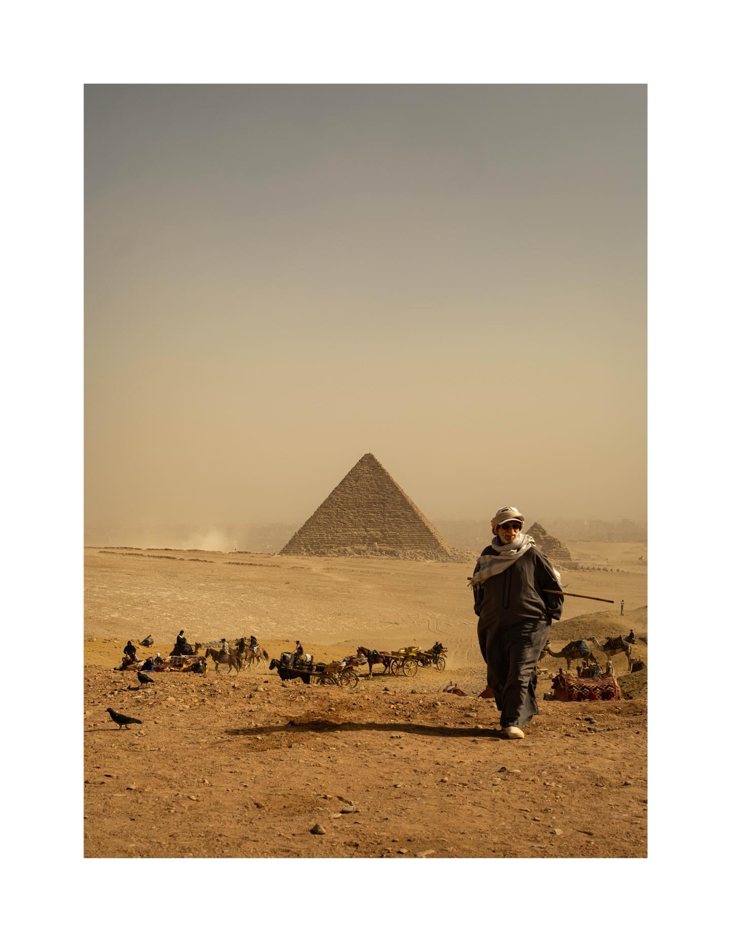 Person walking toward a pyramid