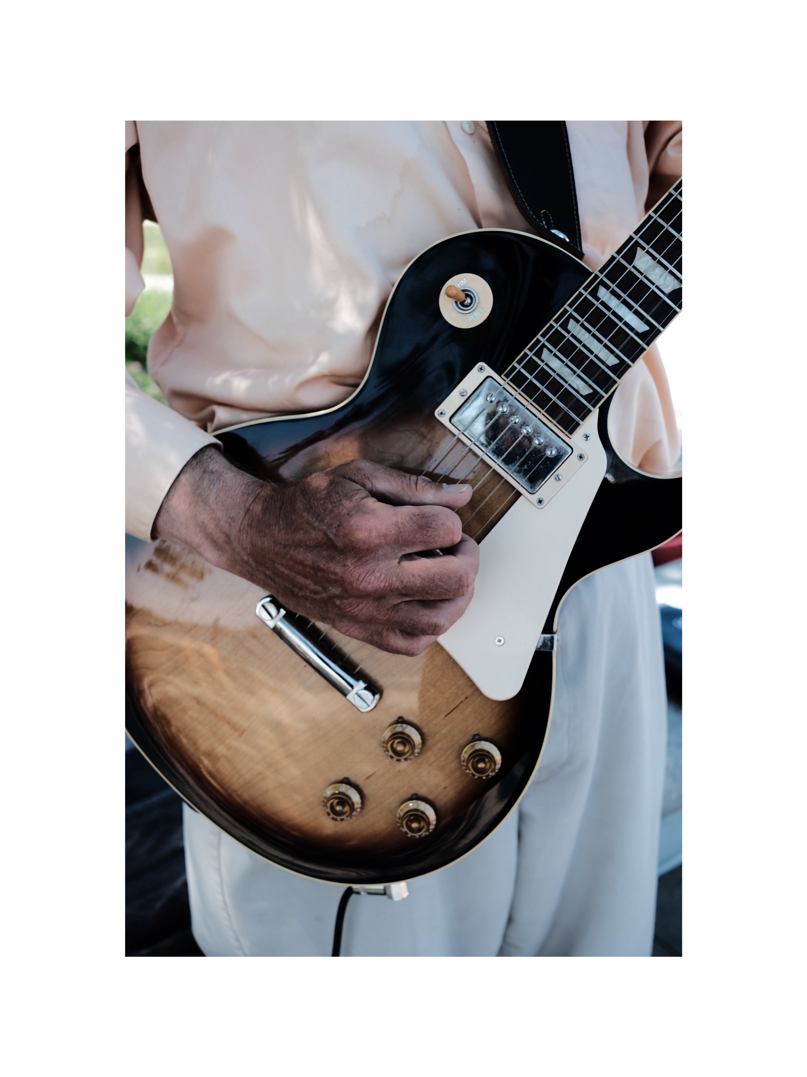 Close view of a guitarist’s hands